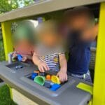 Spielen im Garten bei Däumelinchen Kindertagesplege in Essen